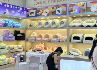 A panoramic view of Petfair Asia 2025 at the Shanghai New International Expo Centre, featuring crowded exhibition halls, international pet brands, and professional visitors.